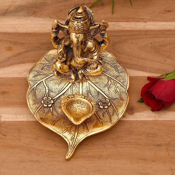 SHENKY Metal Ganesh ji on Leaf with Diya Idol Showpiece for Home Décor and Diwali Gift Gold Plated Table Diya
