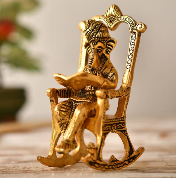 Fashion Bizz Metal Lord Chair Ganesha Reading Ramayana Statue Hindu God Ganesh Ganpati Sitting on Chair Idol Sculpture Home Office Gifts Decor Gold Plated Exclusive Gift for Diwali, Corporate Gift and Wedding and Return Gifts Decorative Showpiece  -  15 cm