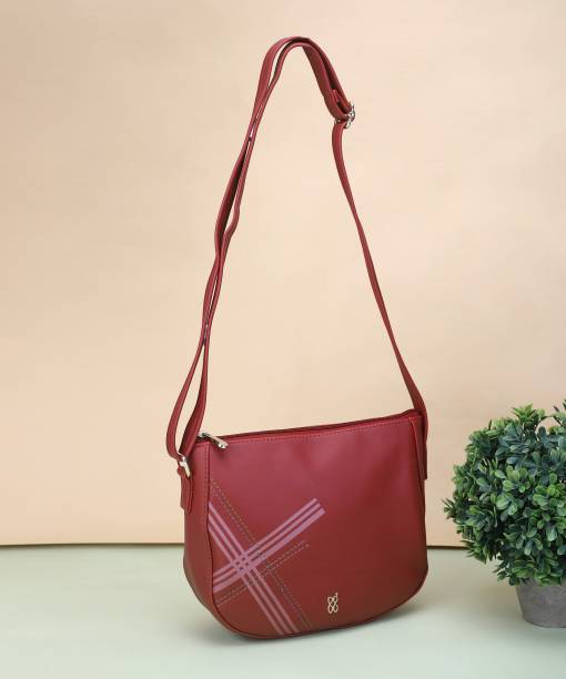 Baggit Red Sling Bag LXE HALTY E DIEGO PLUMPPIE