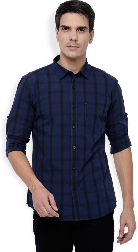 grey pants blue checkered shirt