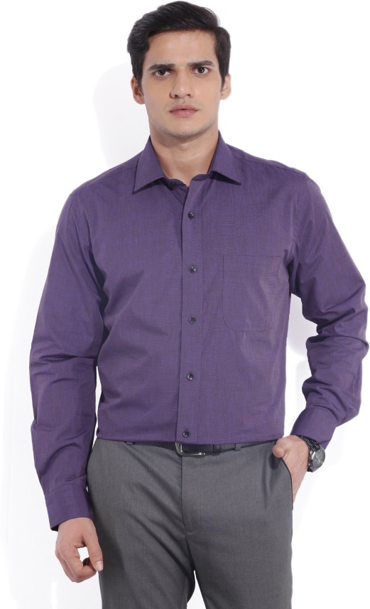 purple shirt grey pants