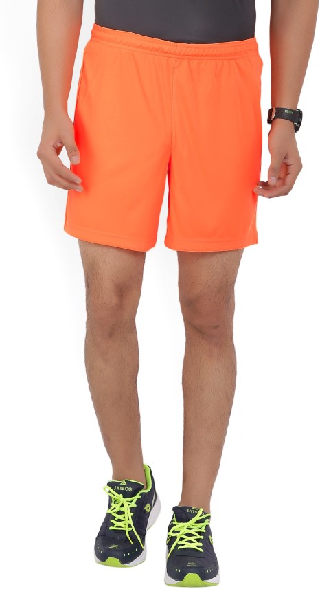 orange puma shorts