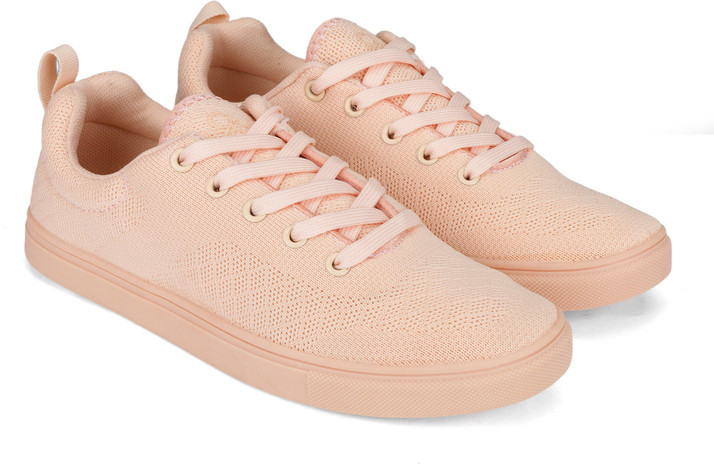 peach color sneakers