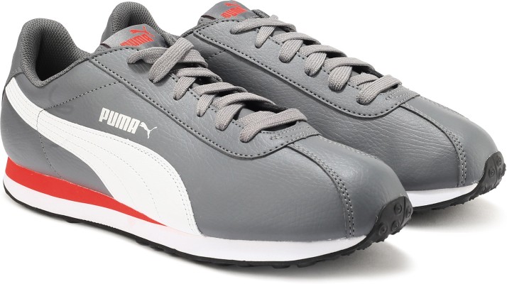 grey and white puma shoes