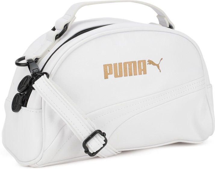 white and gold pumas with purse