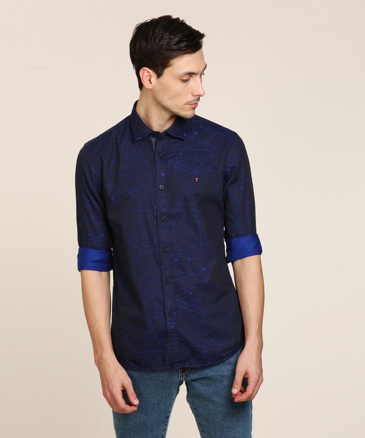 navy blue shirt with dark blue jeans