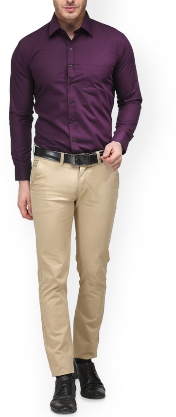 purple shirt beige pants