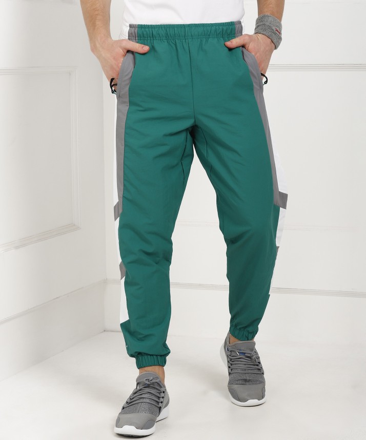 green adidas track pants mens