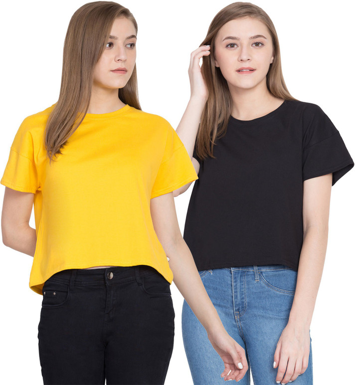 yellow top and black jeans