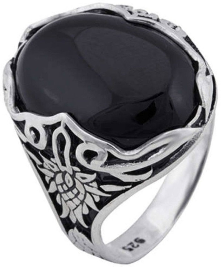 silver ring with black stone
