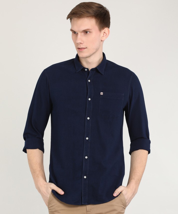 dark blue shirt with dark blue jeans