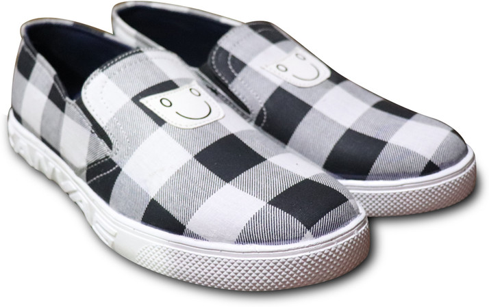 black and white canvas trainers