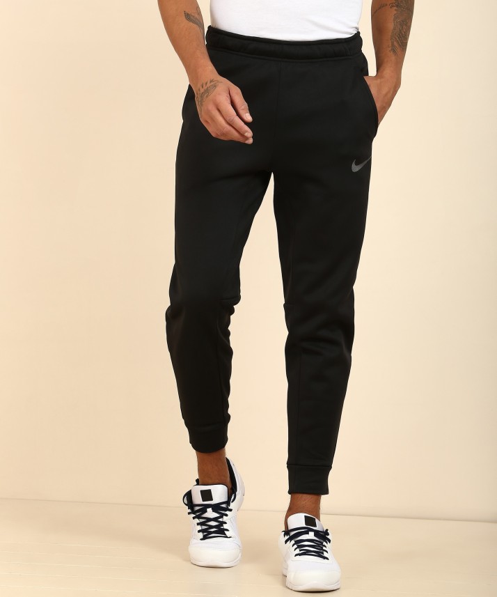 Nike Solid Men Black Track Pants - Buy 