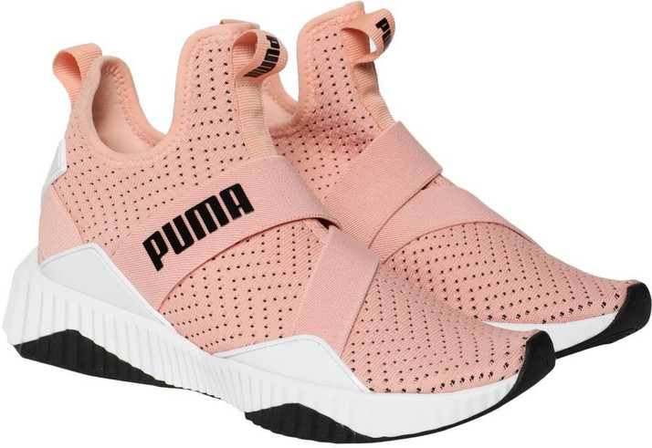 puma defy mid core wns