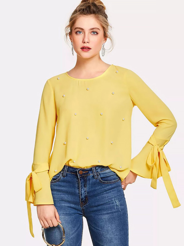 yellow embellished top