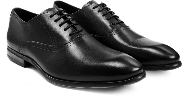 one 8 leather shoes