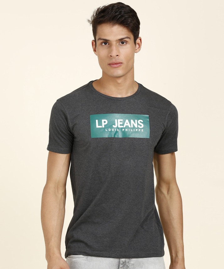 green t shirt black jeans