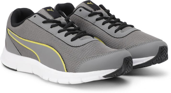 puma grey & yellow running shoe