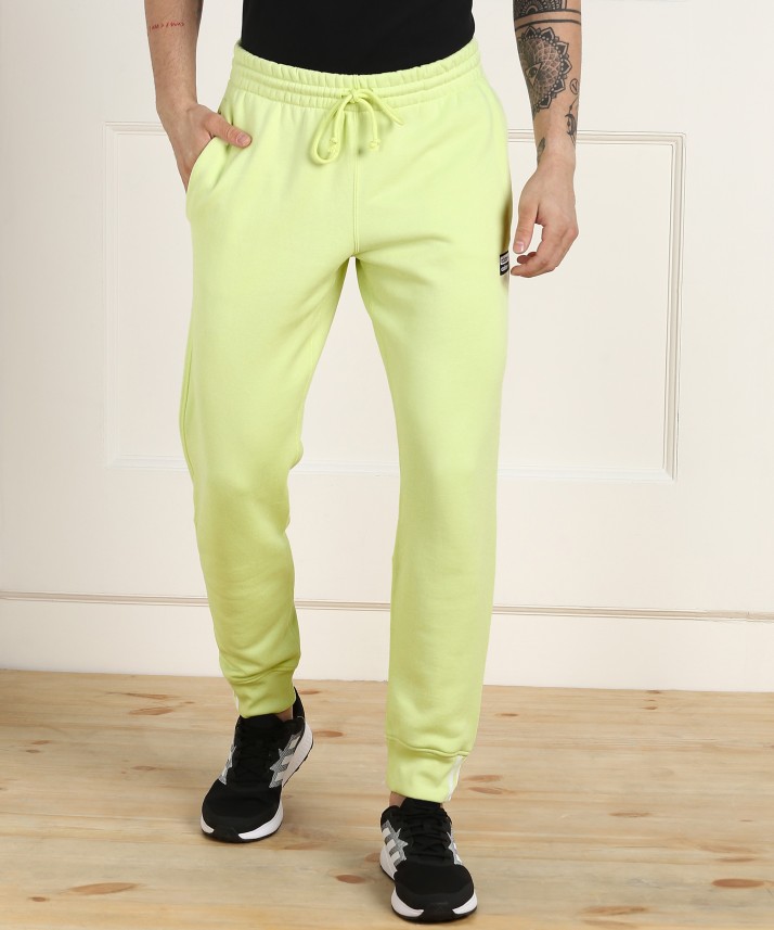 light green adidas pants