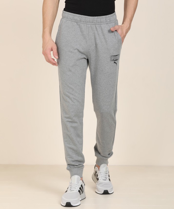 Puma Solid Men Grey Track Pants - Buy 