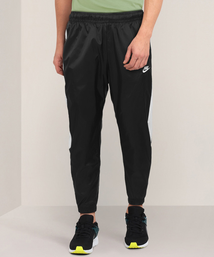 nike solid men's grey track pants