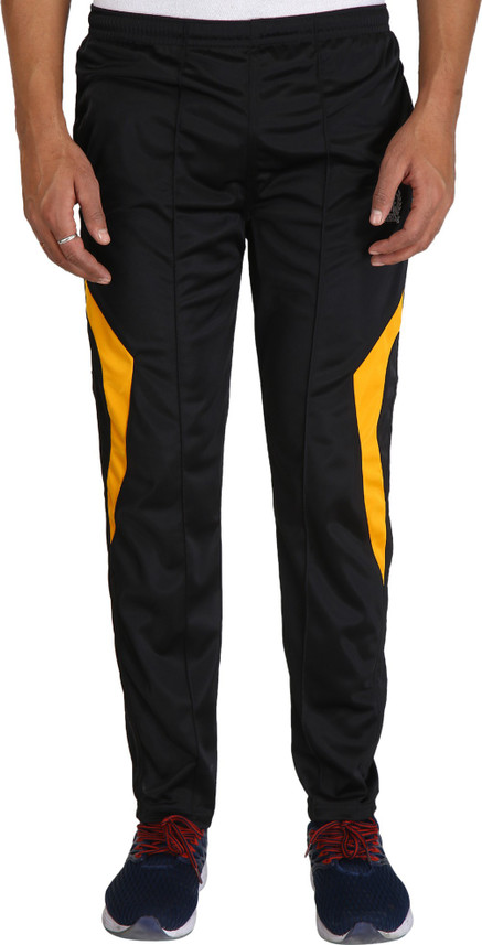 black and yellow track pants