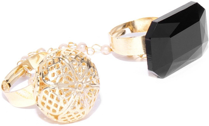 gold ring with black stone