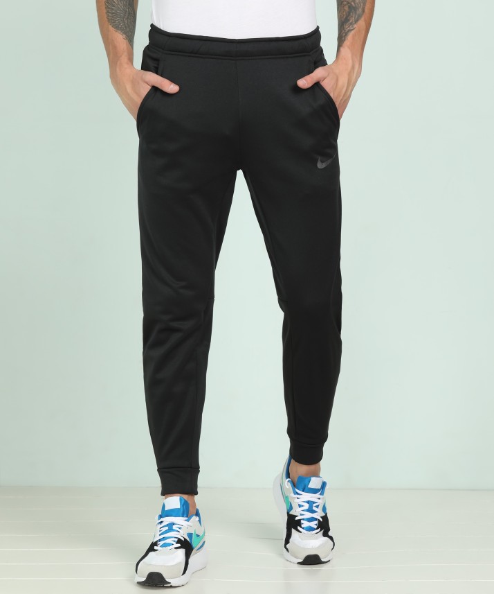 nike solid men black track pants