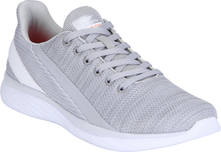 red tape white running shoes