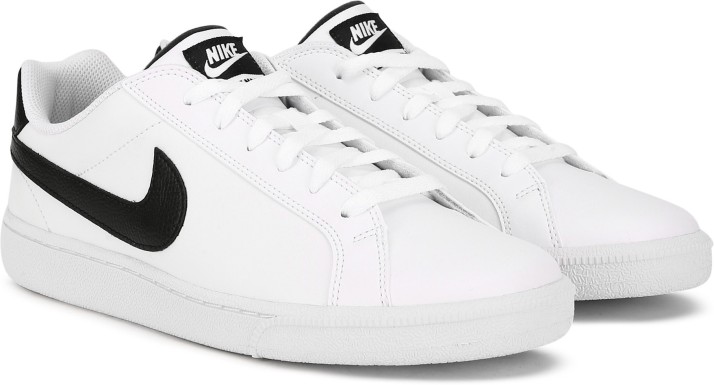 nike white sneakers black logo