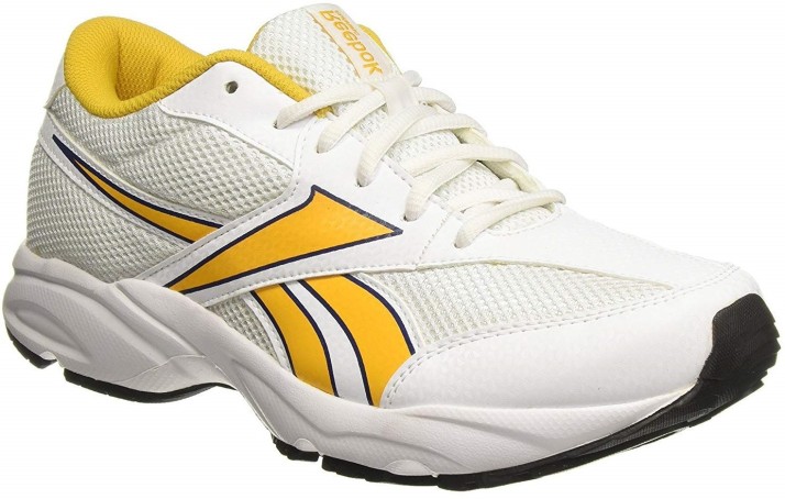 yellow reebok running shoes