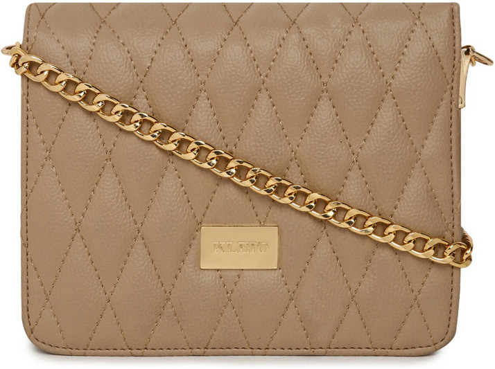 beige sling bag