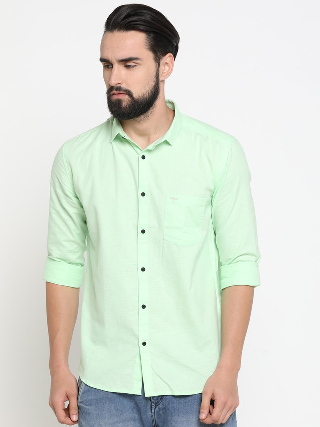 light green shirt with jeans