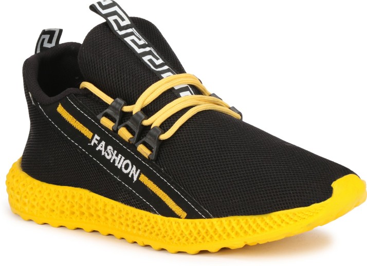 yellow and black gym shoes