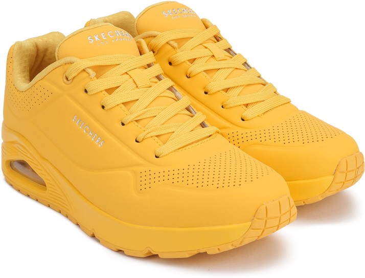 yellow skechers sneakers