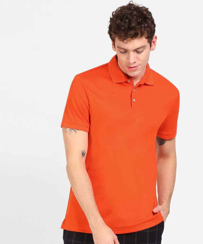 Calvin Klein Solid Men Polo Neck Orange T-Shirt - Buy Calvin Klein Men Polo Neck Orange T-Shirt Online at Best Prices in India | Flipkart.com