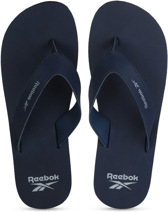 reebok slippers blue