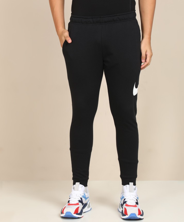 nike solid men black track pants