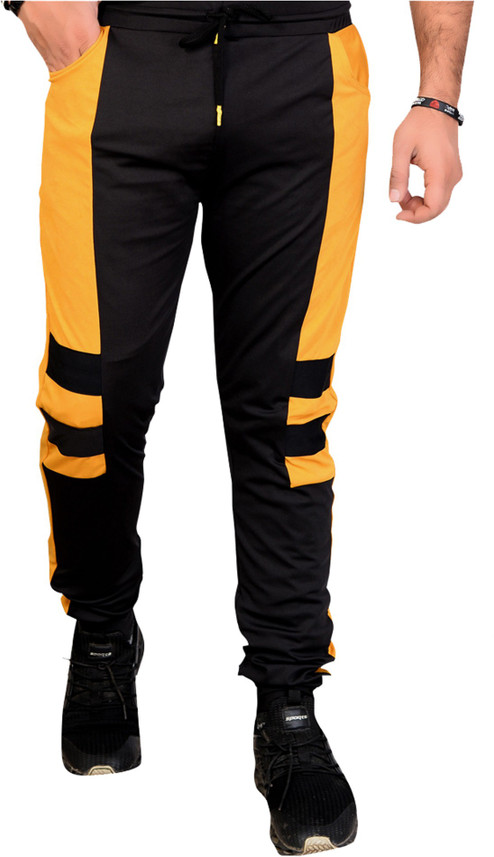 black and yellow track pants