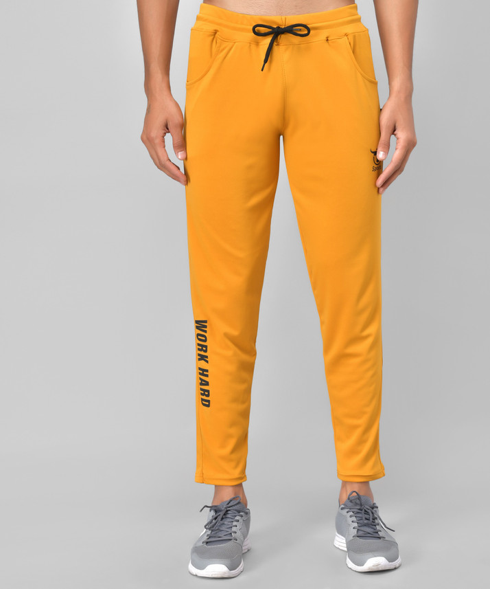 yellow track pants