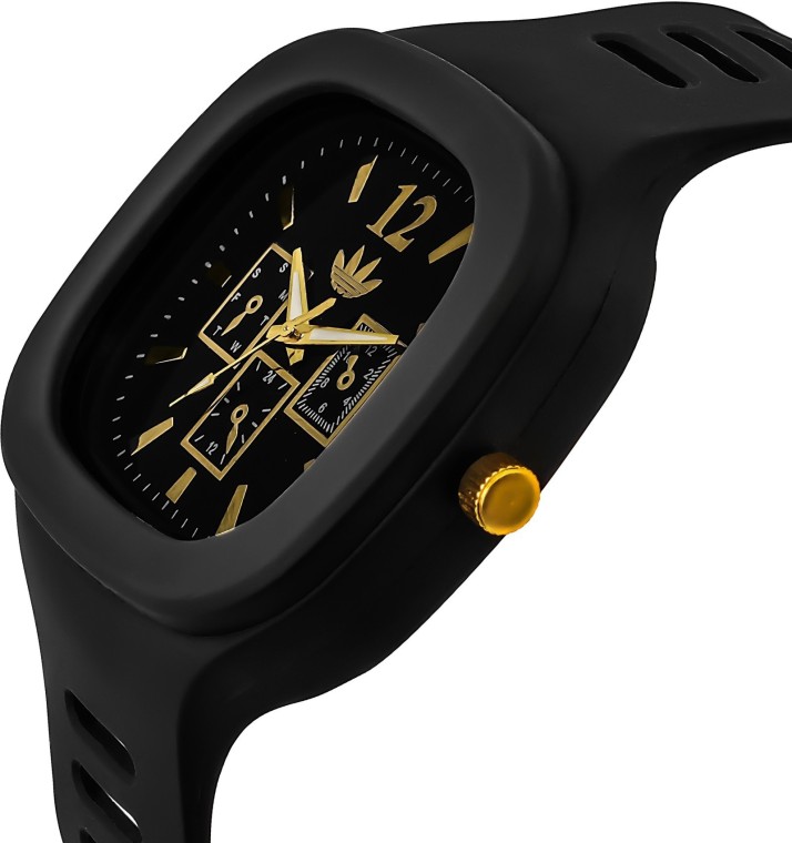 black and golden watch