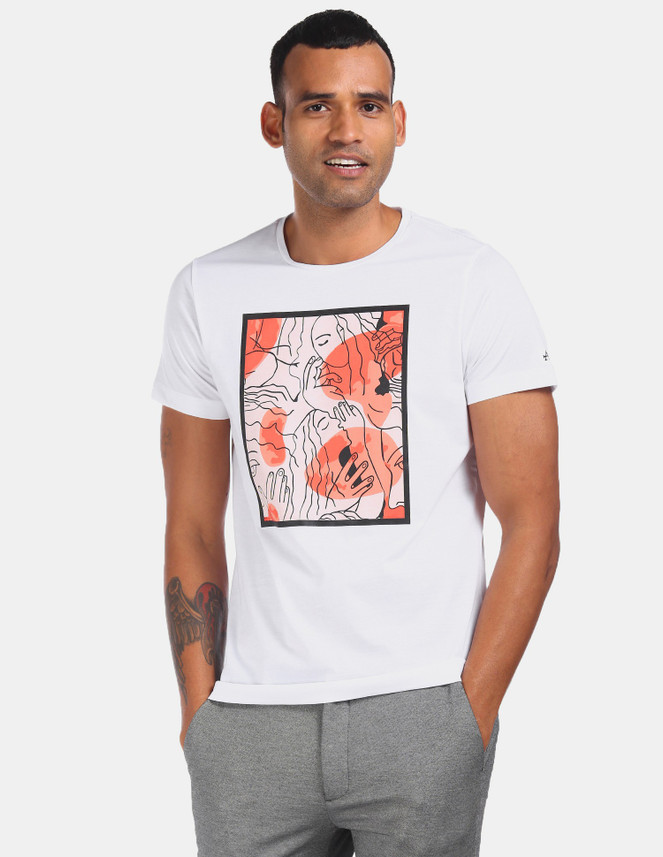 white t shirt with yellow writing
