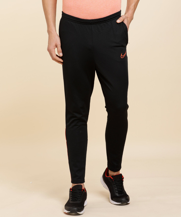 NIKE Solid Men Black Track Pants - Buy 