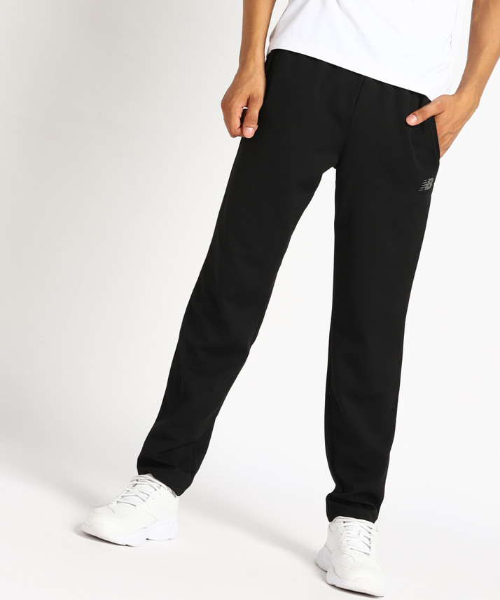 New Balance Solid Men Black Track Pants 