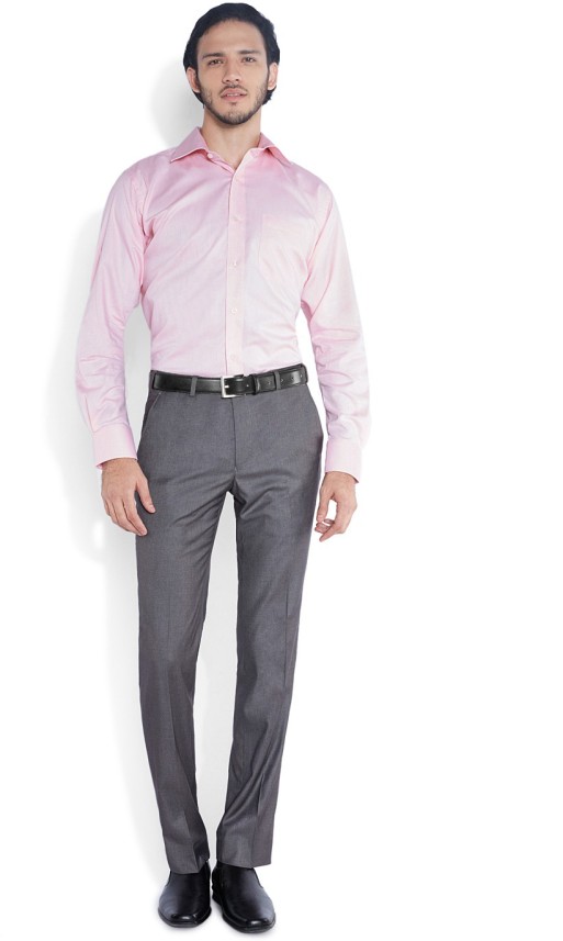 light pink shirt with grey pants