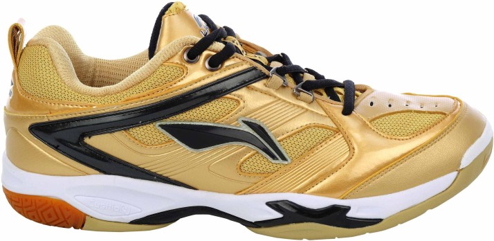 black and gold champion shoes