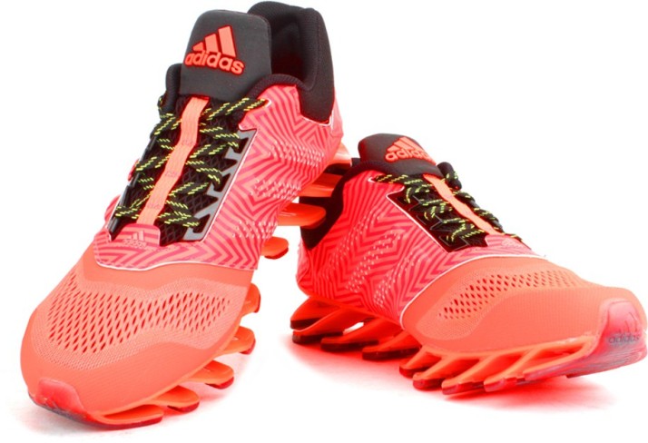 red and black adidas running shoes