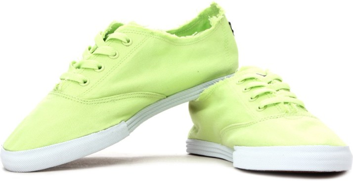 lime green puma sneakers