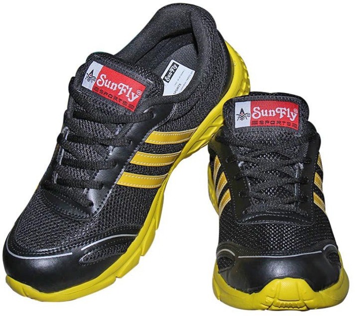black and yellow gym shoes