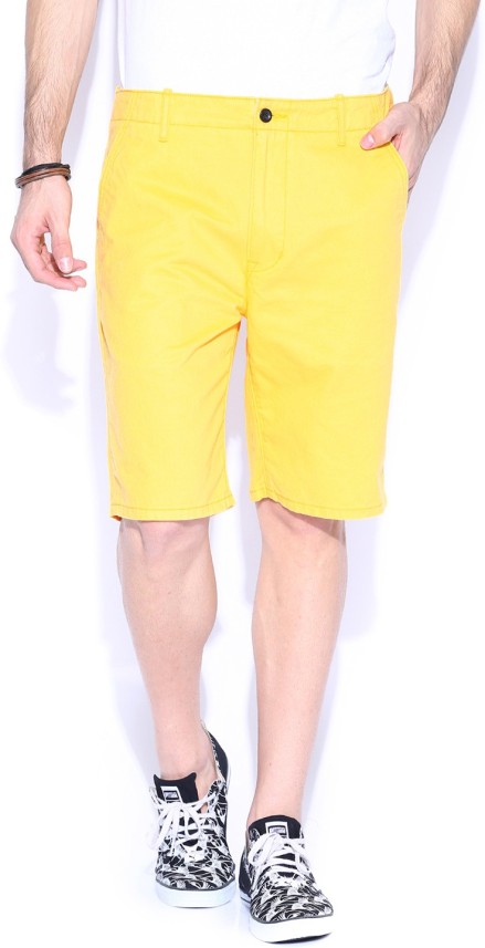 yellow levi shorts